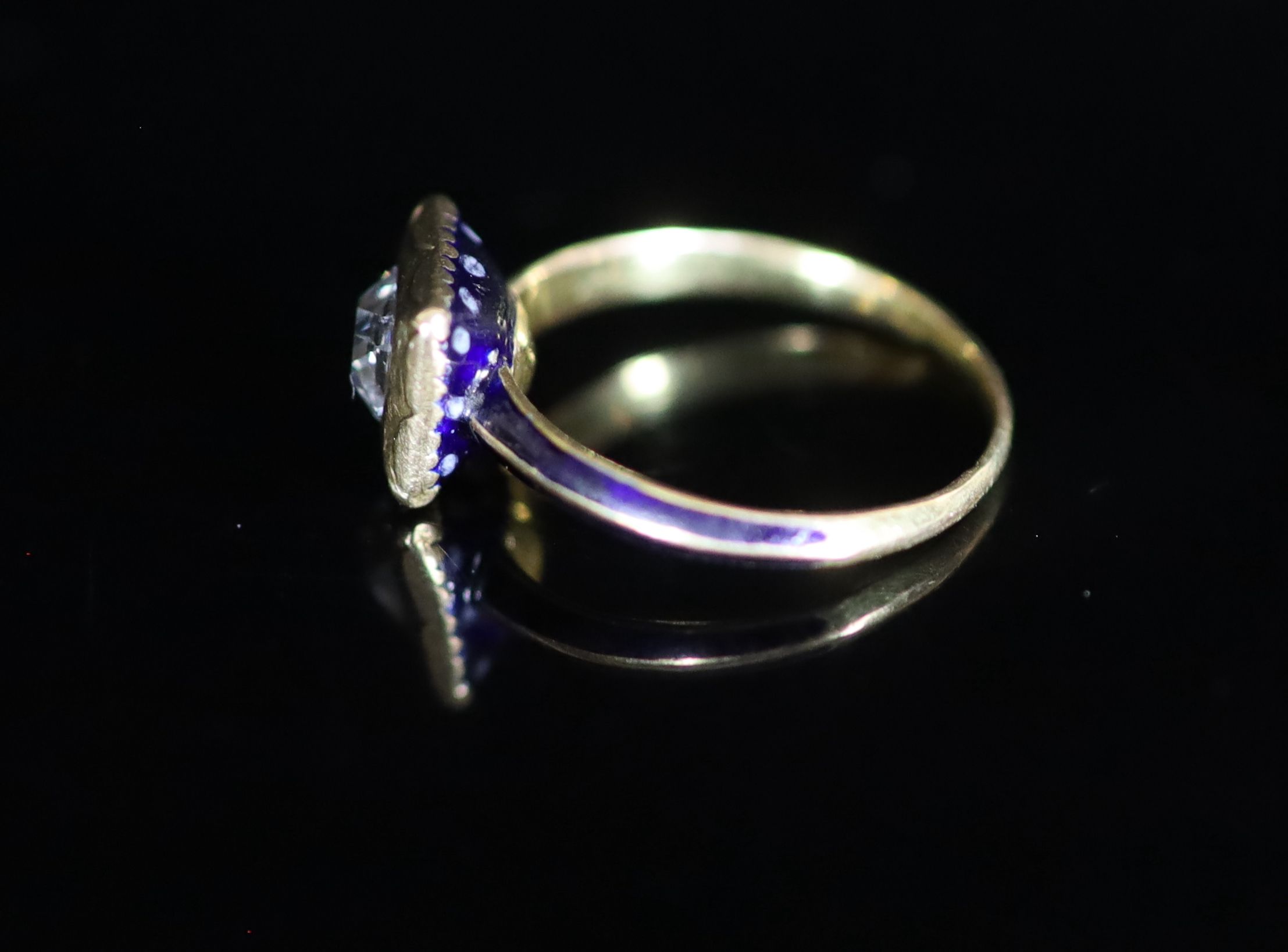 A 19th century gold, blue enamel and old mine cut diamond set ring